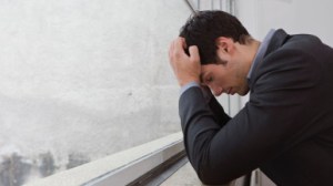 Man contemplating after a days work