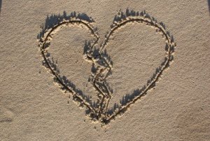 4294111-shape-of-broken-heart-on-sand